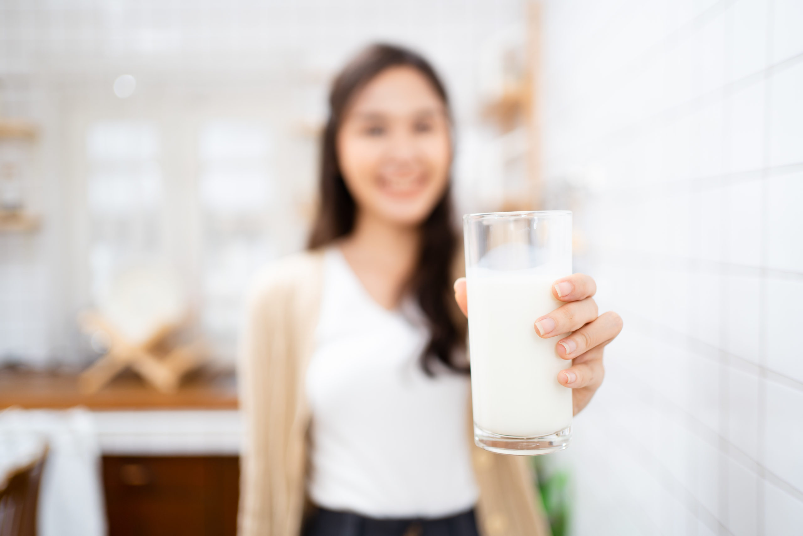 Woman drinking milk.